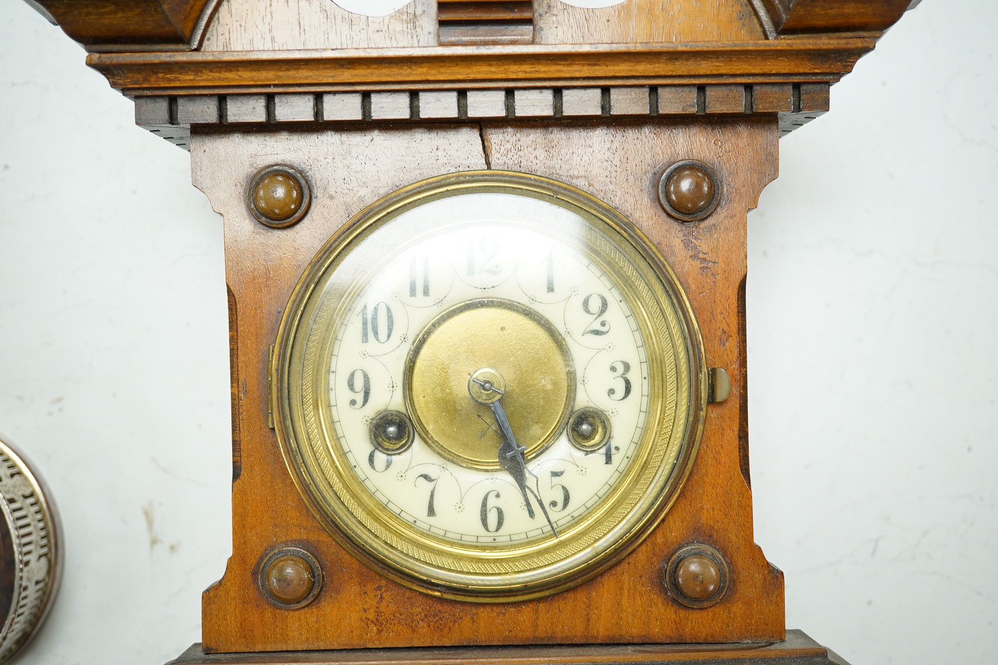 A late 19th century walnut wall clock, barometer and thermometer combination, striking on a coiled gong, 65cm high. Condition - fair, crack to the case and finial missing to the bottom